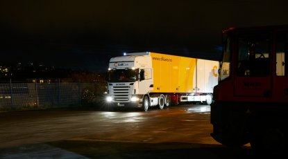 Branded ColliCare trailer during night, ready to deliver predictable goods