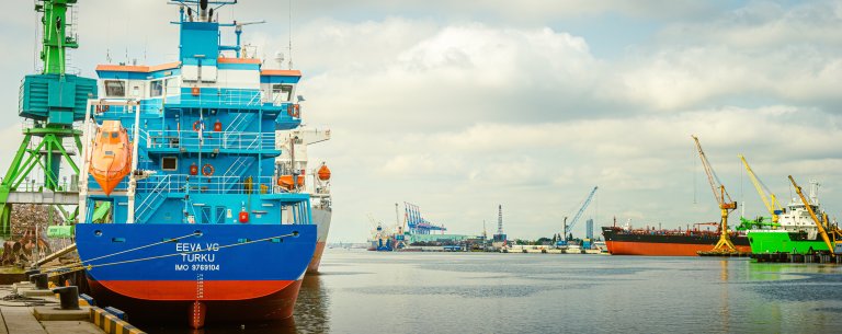 A container vessel laying in the port of Klaipeda.